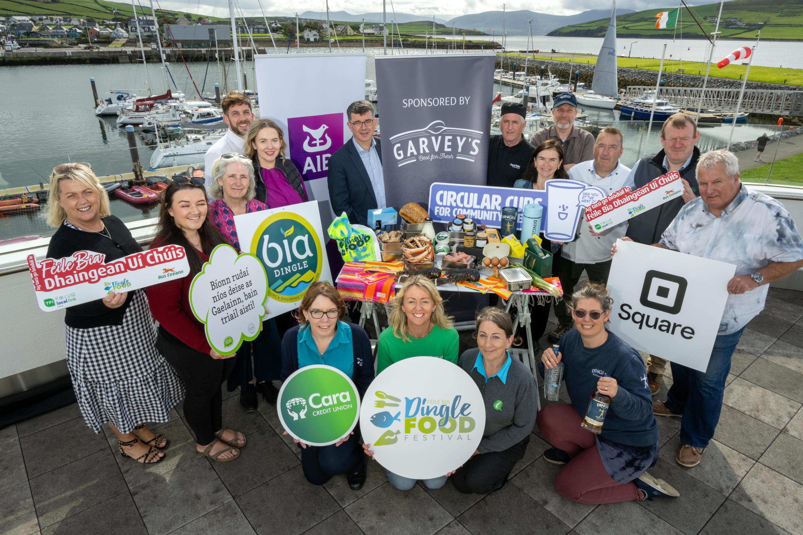Pictured surrounded by local food at the launch of the Dingle Food Festival, which takes place from October 3rd-5th in County Kerry are Martin Bealin, Niamh O'Kennedy, Feargal O’Cinneide and Darach Ó Murchú. Also in photo are sponsors, Fiona Connolly, Bus Eireann, Alan O’Connell, TFI, Local Link Kerry, Mai Bruit, BIA Dingle, Helena Foley, Failte Ireland, Oonagh O’Sullivan, Cara Credit Union, Breda Moriarty, Kerry County Council, Cristín de Mordha, Dúchas an Daingin, Jim Garvey and Danny O’Se, Garveys Dingle, Roisin Healy and Diarmaid Fitzgerald, AIB, Marie Charland, Dingle Distillery, Sean Murphy, Murphy’s Ice Cream.
Photo: Don MacMonagle
PR photo Issued on behalf of Dingle Food festival
Press Release
Dingle Food Festival - All of the local taste and none of the waste!
Taking place from Friday 3rd to Sunday the 5th of October in Dingle County Kerry, food lovers are in for a treat as local food is celebrated at the hero of this year's festival. Zero Waste will once again be a key driver of the 2025 Food Festival, as Dingle continues on its mission to be the first Irish “Zero Landfill Waste” festival.
Over the weekend the Bia Dingle Showcase, in the centre of the town, will highlight the local food of the Dingle Peninsula as festival goers can meet local producers and literally taste the peninsula! Festivities kick off Friday night with Ceiliúradh Bídh Chorca Dhuibhne. This ticketed event is a harvest celebration of the naturally produced food & drink from the Dingle Peninsula, intertwined with local music, song, food and drink to celebrate the food traditions of Corca Dhuibhne.
Masterclasses invite visitors to learn from the best! and include, Cork based Chef Takashi - who was awarded a prestigious Michelin Star in his first year after opening Ichigo Ichie, Asia Mahealani McDonagh, the first ever Irish Pâtisserie Champion and the owner of Mahealani Pastries in Galway and Dingles very own Peter White, founding member and former president of the Irish Whiskey Society.
The Dingle Food Festival, with the help of the local community sustainability group Transition
Corca Dhuibhne, is continuing on its mission to be Zero-Waste to landfill. Festival goers are encouraged to bring their own bowl, cutlery and cup to help in the effort of reducing the huge waste that is being created by the festival. Rinse stations and waste segregation bins will be provided.
There will be stainless steel bowls available to rent and return and also festival packs on sale consisting of a bamboo bowl and cutlery set. Taste trail and market outlets will only be serving food onto reusable tableware, with the main aim being to reduce the amount of disposable packaging over the weekend.
Highlights of this year’s festival include the much loved Taste Trail, where festival goers purchase a book of taste tickets and get to sample food delights throughout the picturesque town. Along with the numerous masterclasses and workshops, there will be over 70 market stalls, street entertainment, live music and kids activities… there really is something for everyone! Tickets for all masterclass and workshops can be purchased from dinglefood.com